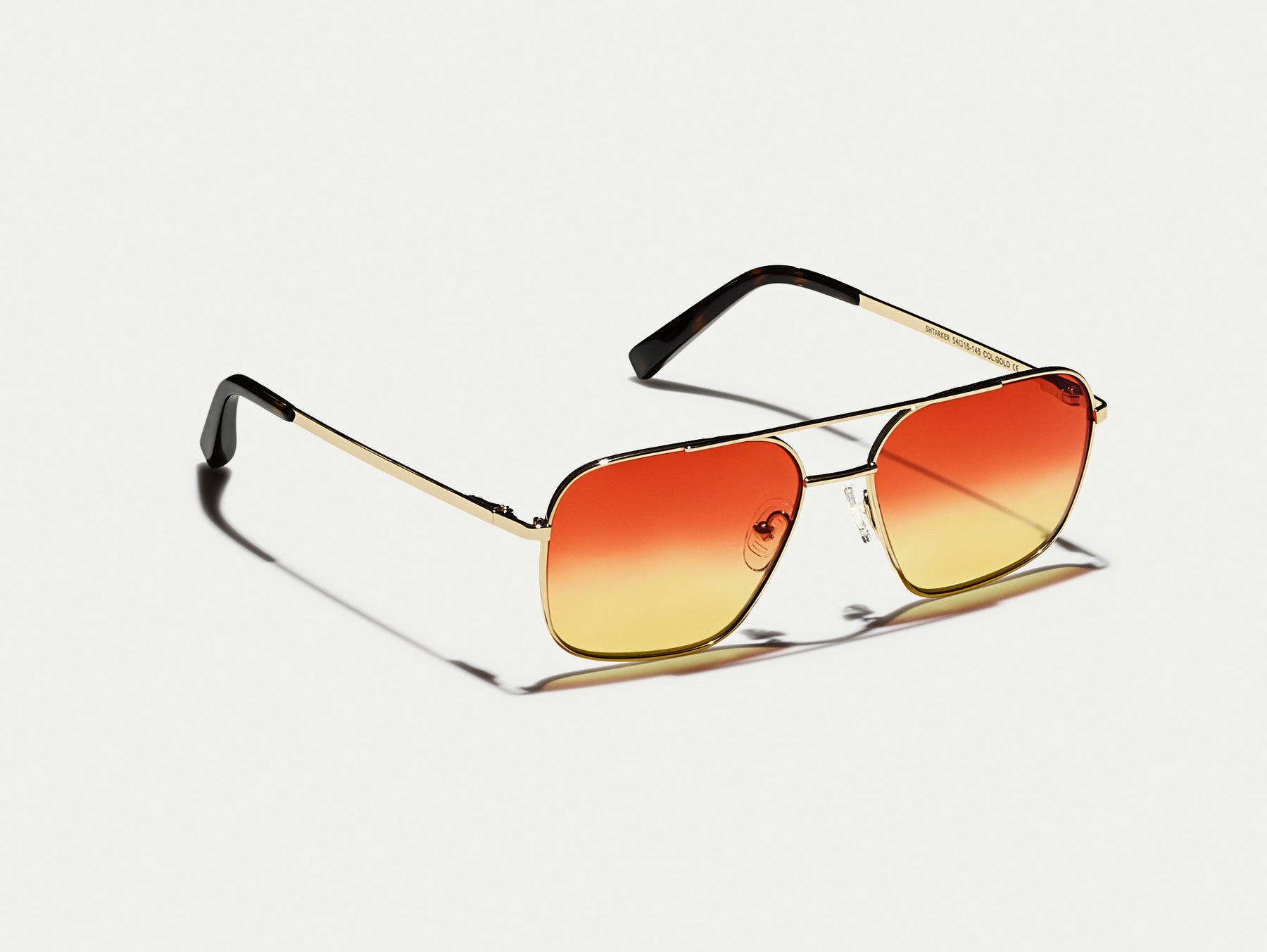 The SHTARKER in Gold with Candy Corn Tinted Lenses