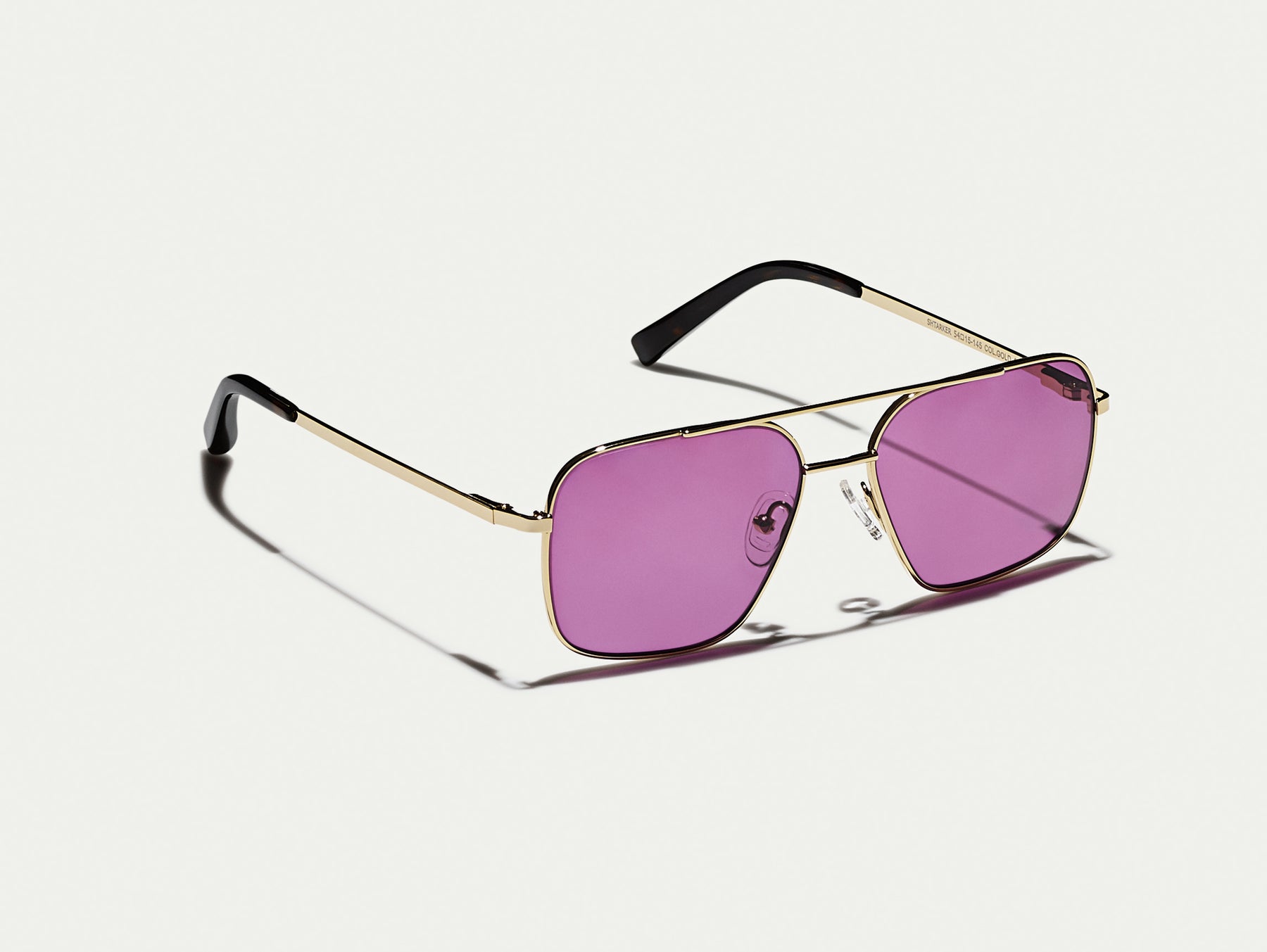 The SHTARKER in Gold with Purple Nurple Tinted Lenses