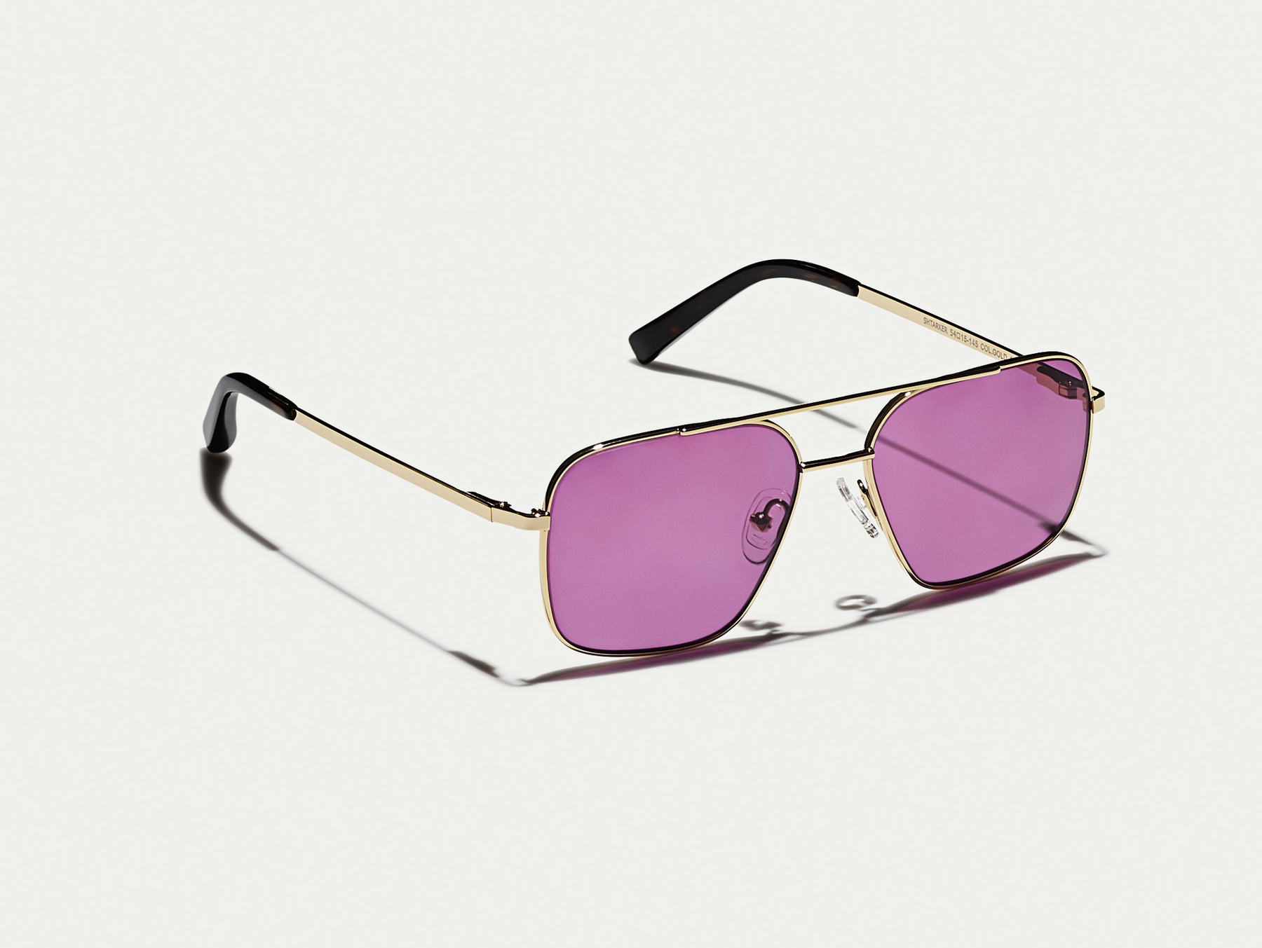 The SHTARKER in Gold with Purple Nurple Tinted Lenses