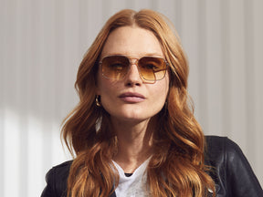 Model is wearing The SHTARKER in size 54 in Gold with Chestnut Fade Tinted Lenses