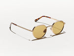 The SMENDRINK SUN in Gold with Amber Tinted Lenses