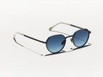 The SMENDRINK SUN in Navy with Denim Blue Tinted Lenses