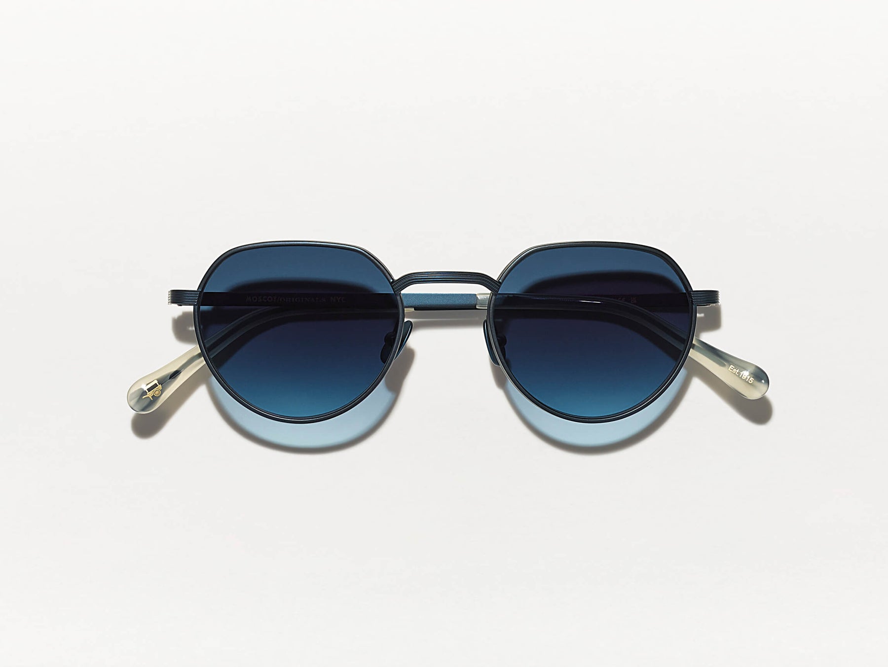 The SMENDRINK SUN in Navy with Denim Blue Tinted Lenses