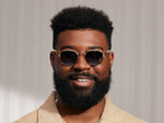 Model is wearing The TINIF SUN in Cinnamon/Gold in size 48 with Denim Blue Tinted Lenses