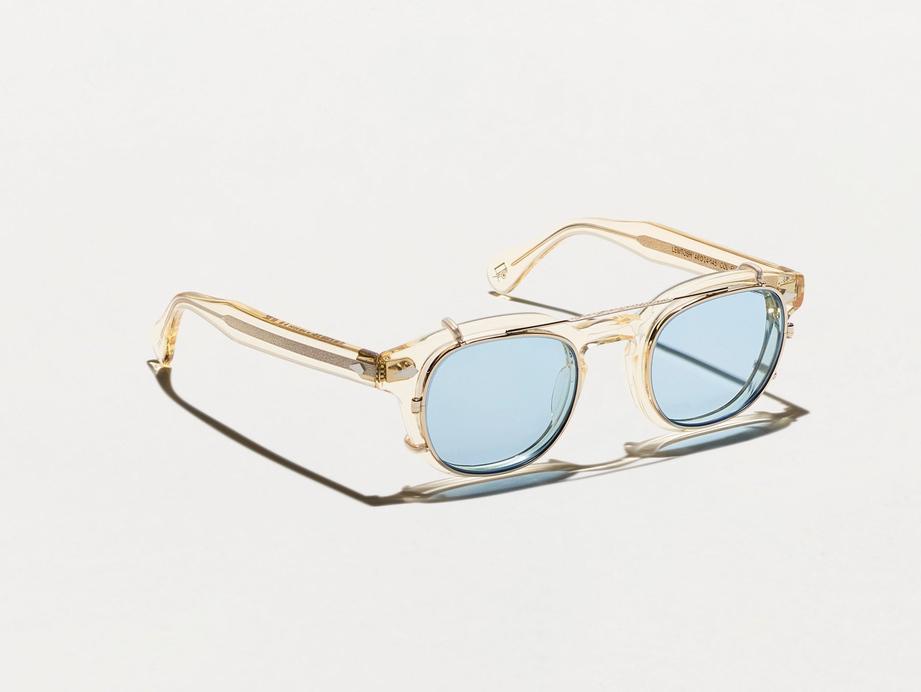 The CLIPTOSH in Gold with Bel Air Blue Tinted Lenses