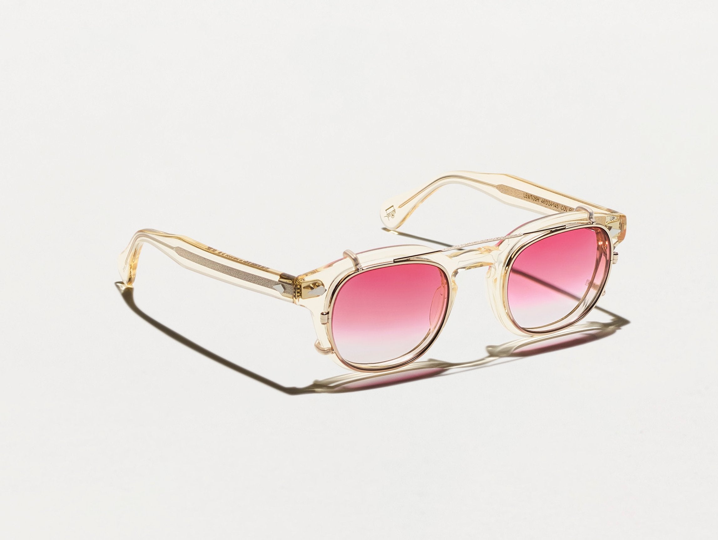 The CLIPTOSH in Gold with Big Apple Fade Tinted Lenses