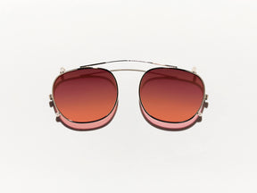 The CLIPTOSH in Gold with Cabernet Tinted Lenses