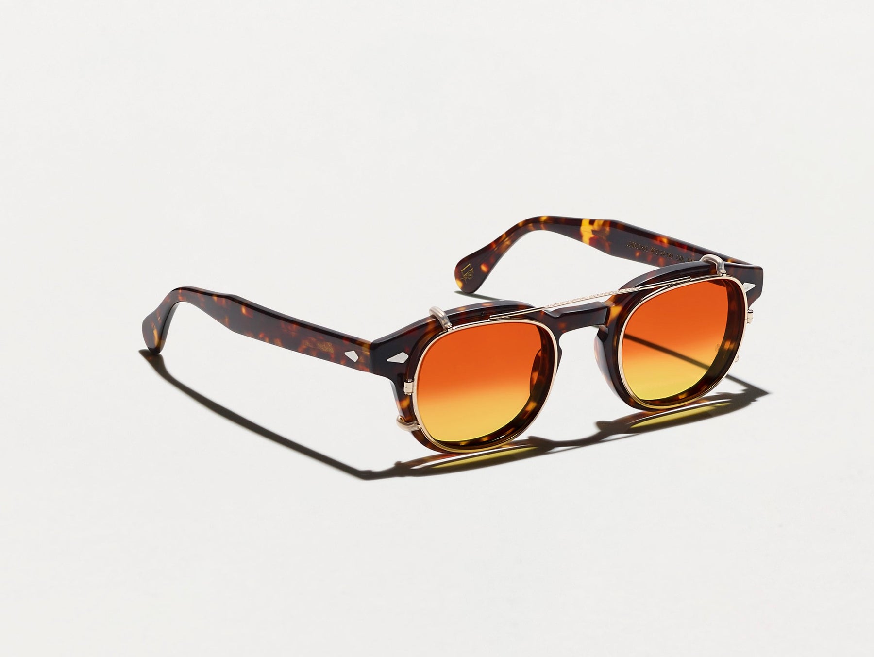 The CLIPTOSH in Gold with Candy Corn Tinted Lenses