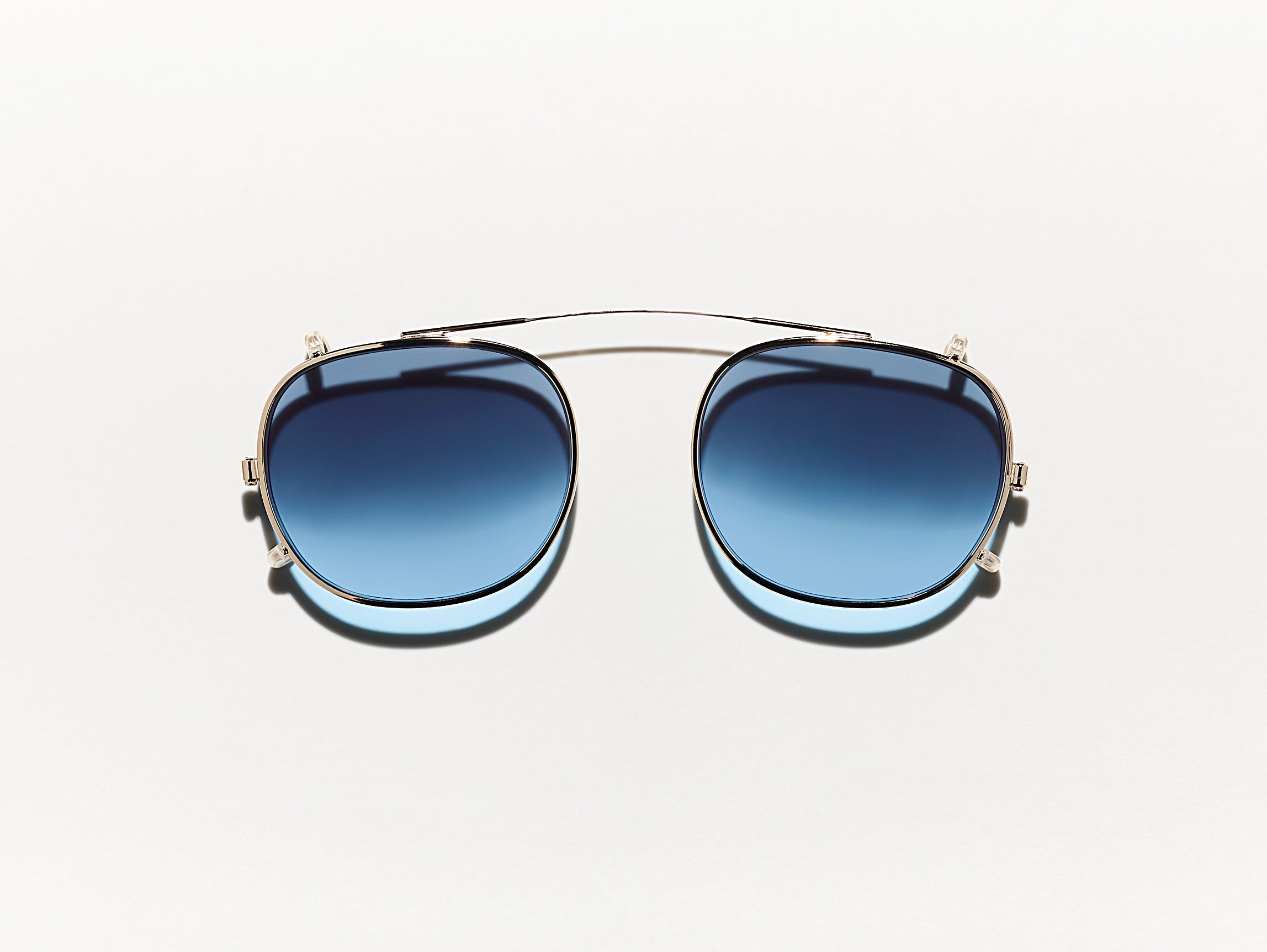 #color_denim blue | The CLIPTOSH in Gold with Denim Blue Tinted Lenses