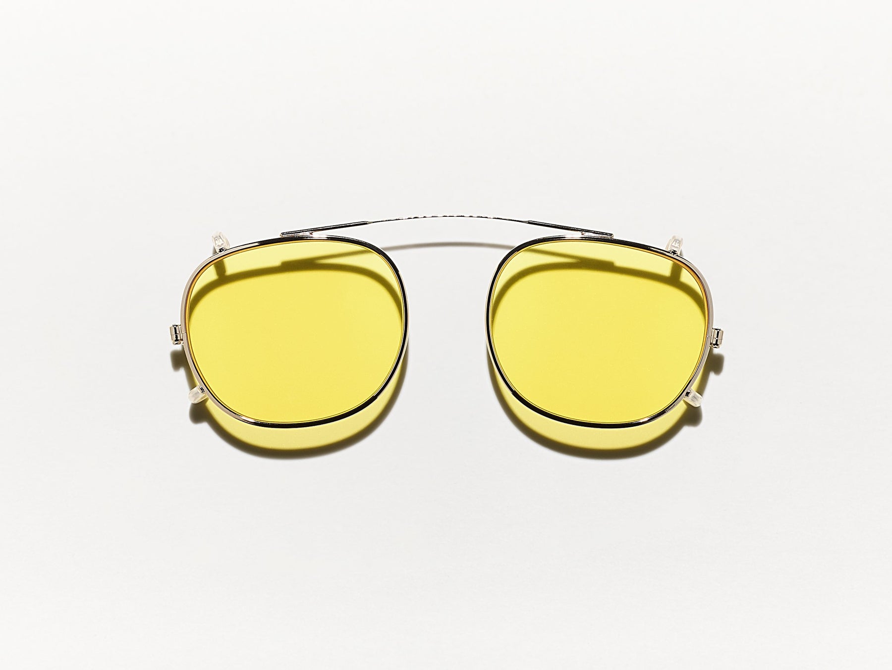 The CLIPTOSH in Gold with Mellow Yellow Tinted Lenses