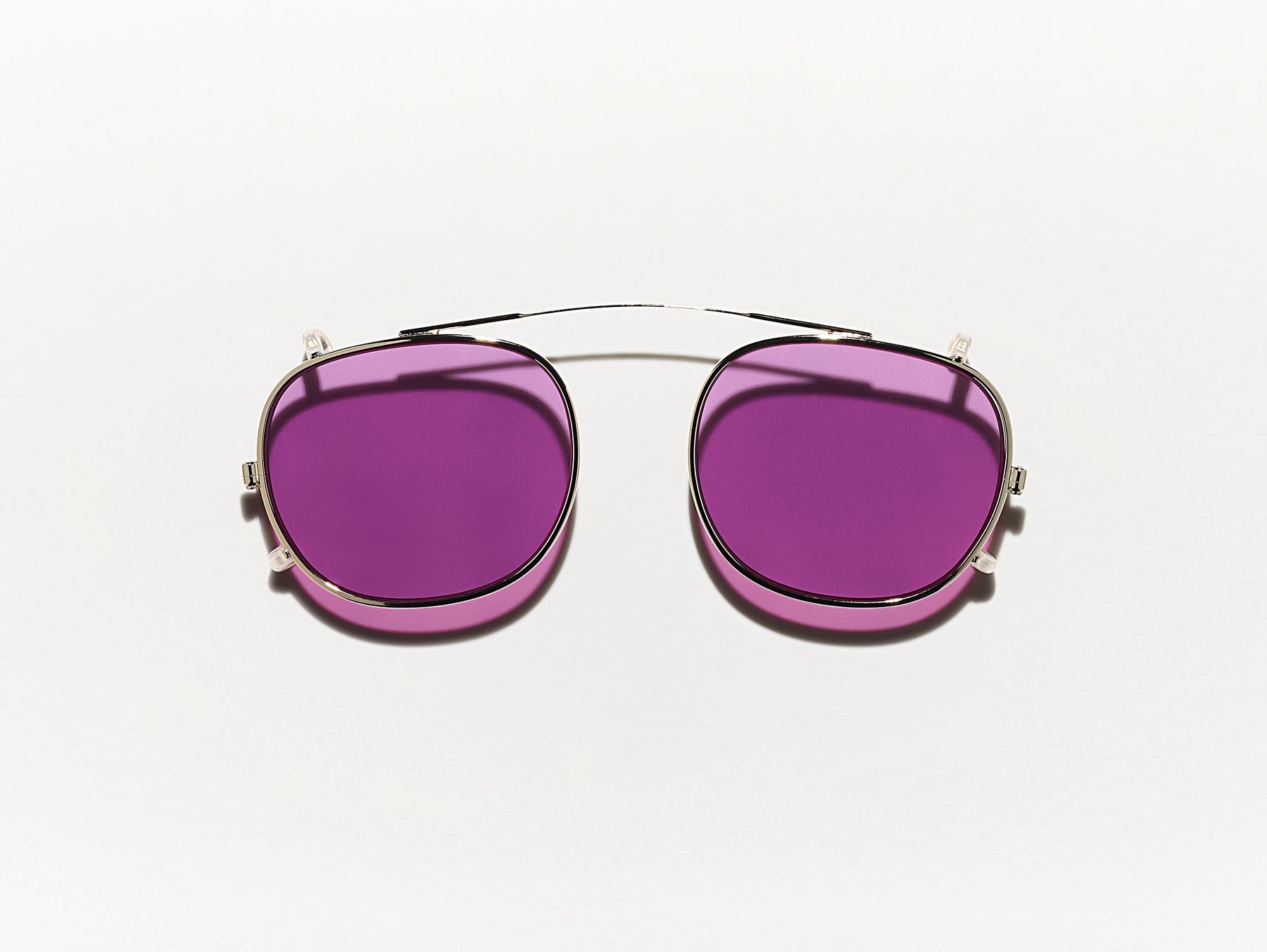 The CLIPTOSH in Gold with Purple Nurple Tinted Lenses