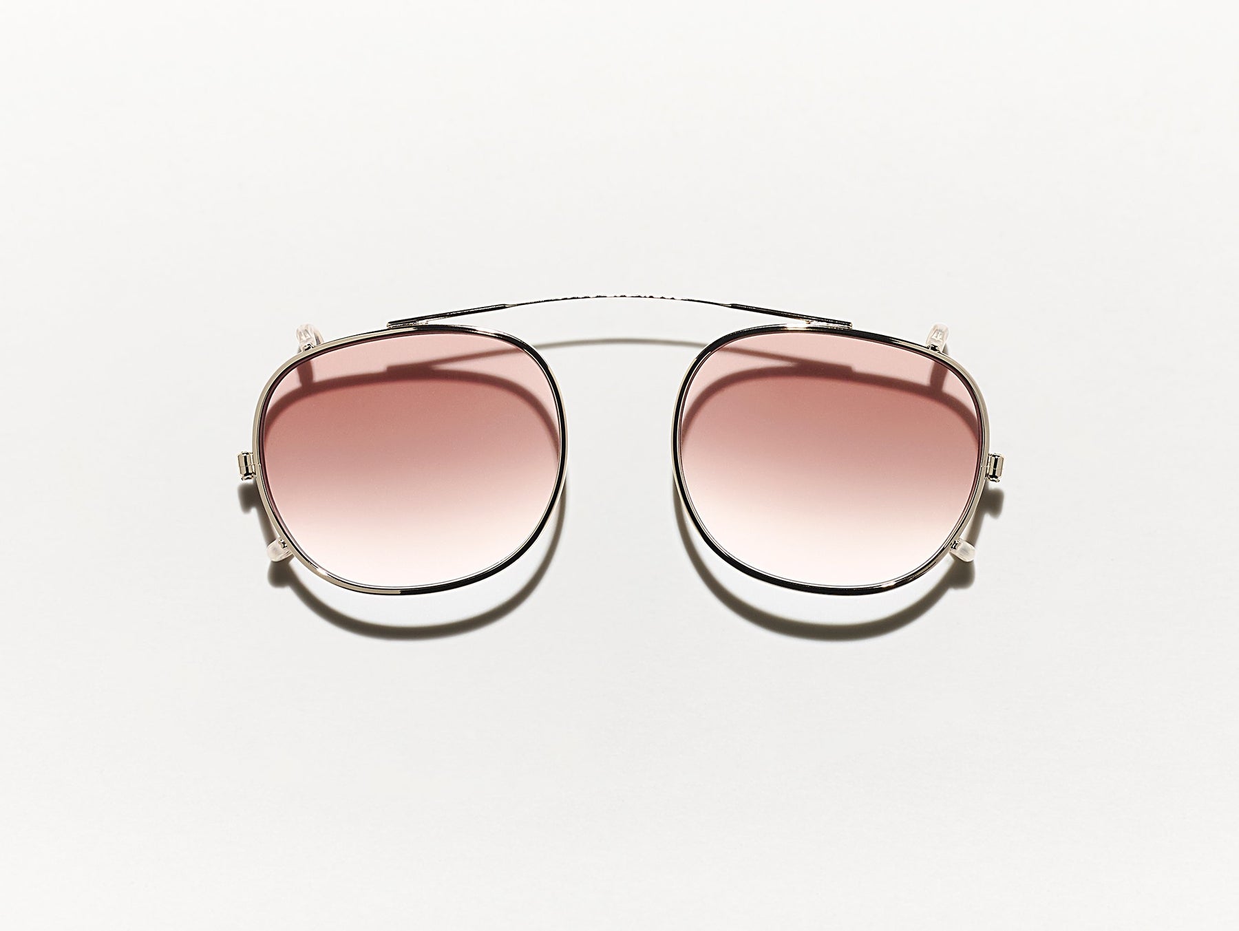 The CLIPTOSH in Gold with Root Beer Fade Tinted Lenses