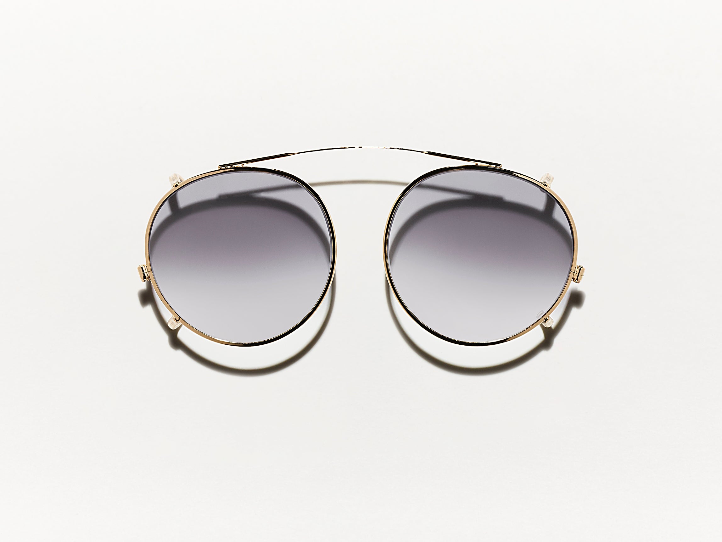 The CLIPZEN in Gold with American Grey Fade Tinted Lenses