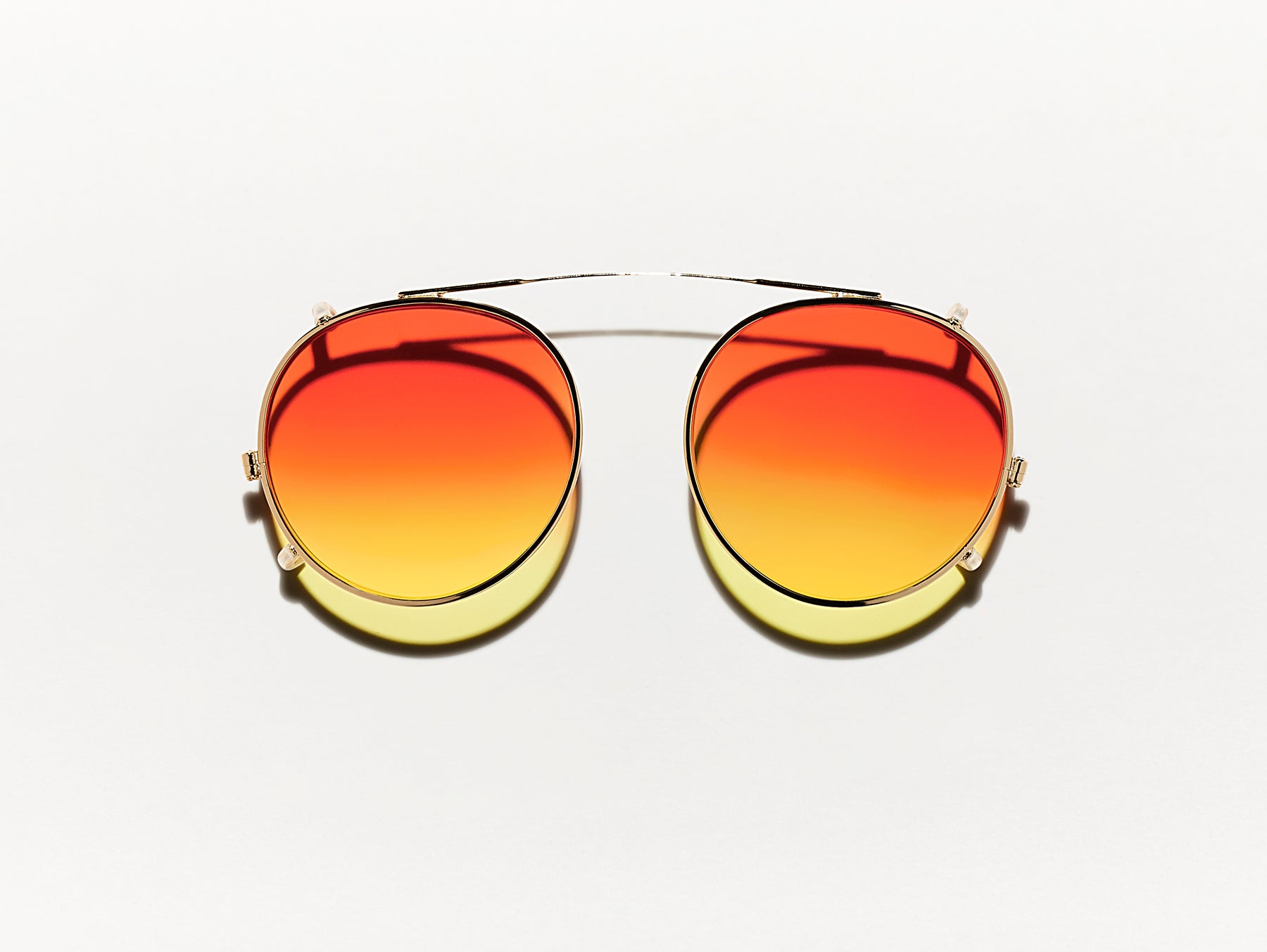 The CLIPZEN in Gold with Candy Corn Tinted Lenses