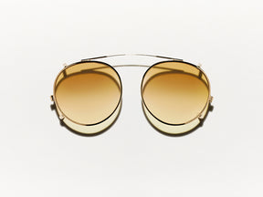 The CLIPZEN in Gold with Chestnut Fade Tinted Lenses