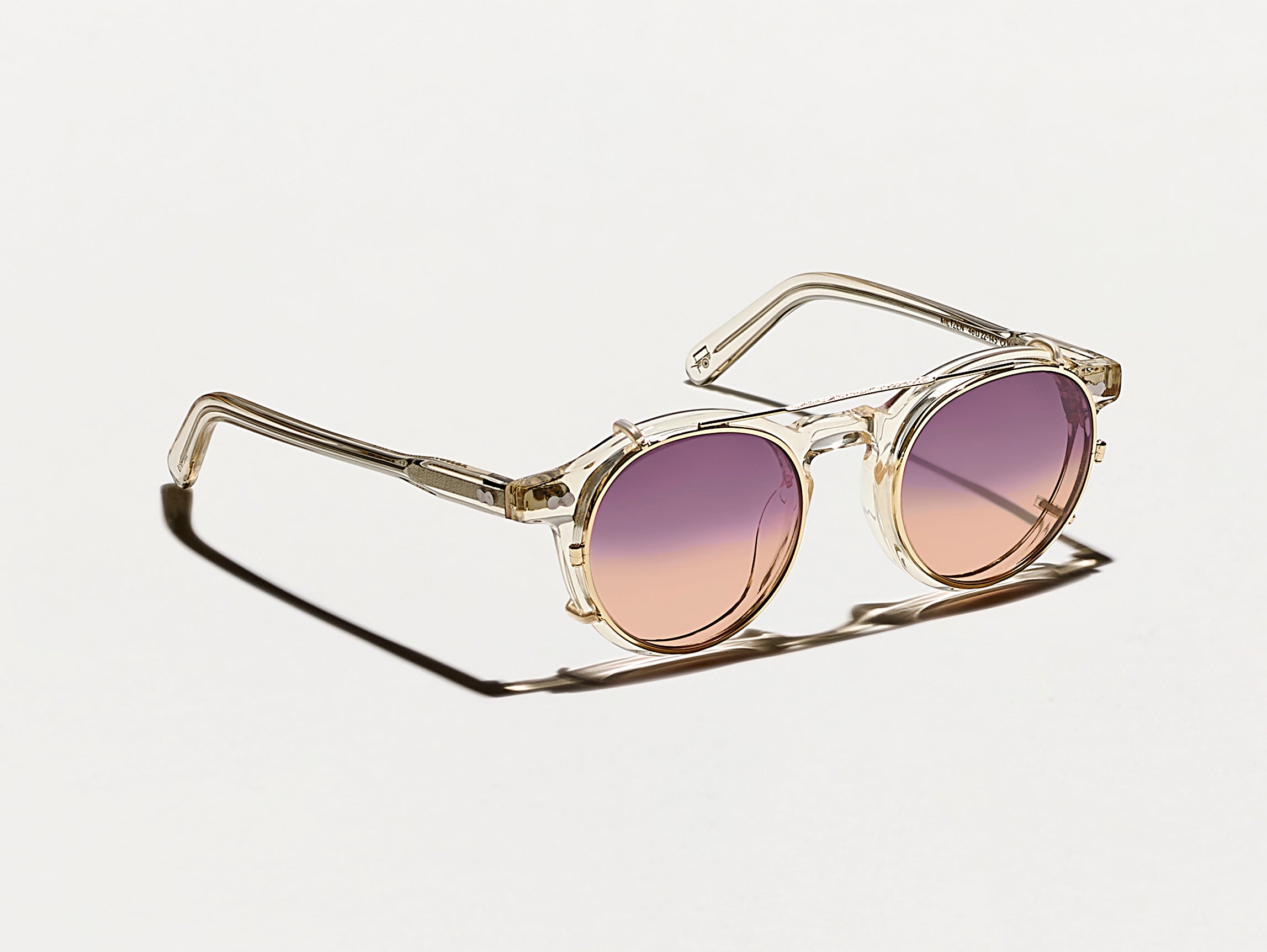 The CLIPZEN in Gold with City Lights Tinted Lenses