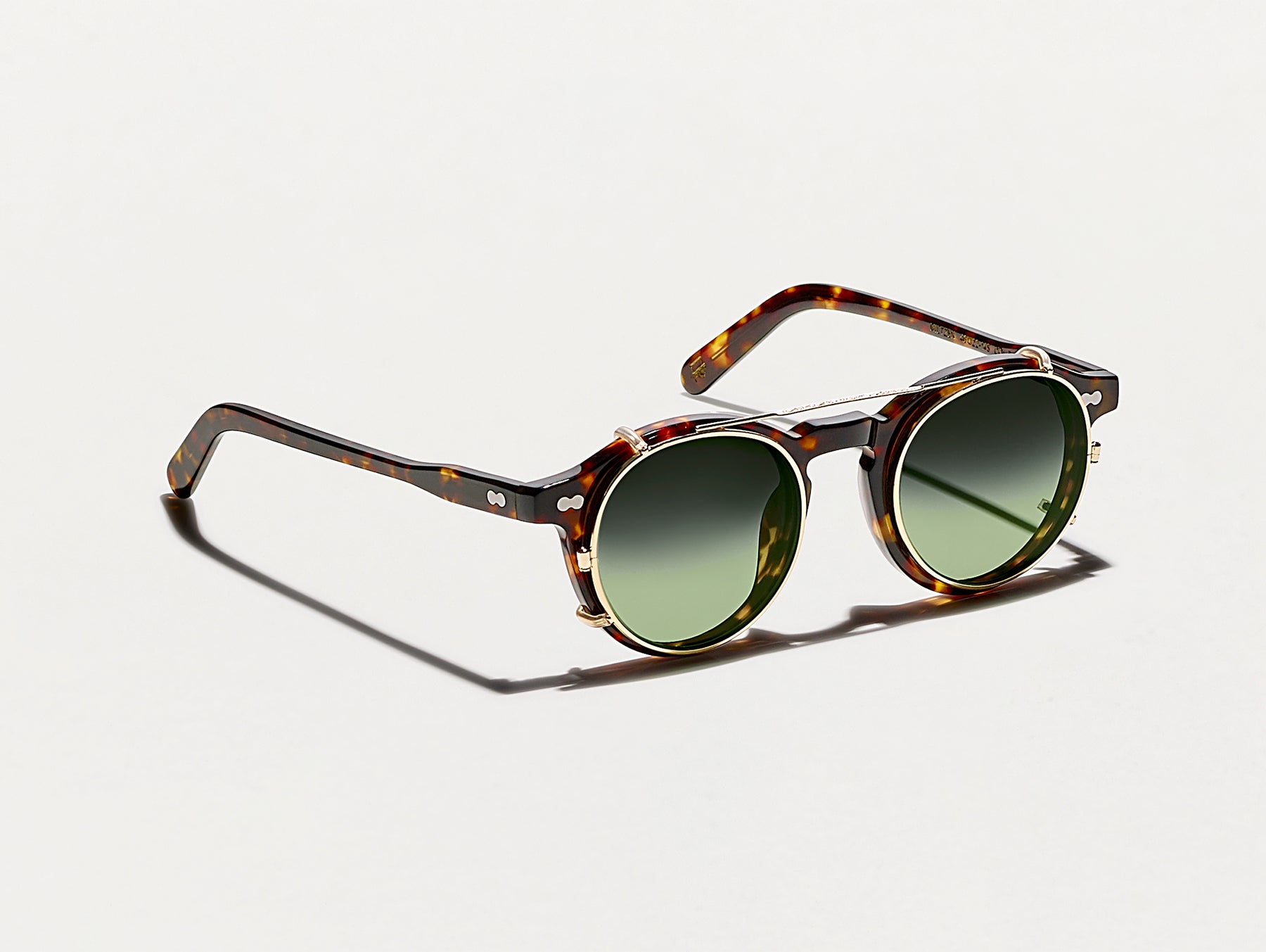 The CLIPZEN in Gold with Forest Wood Tinted Lenses