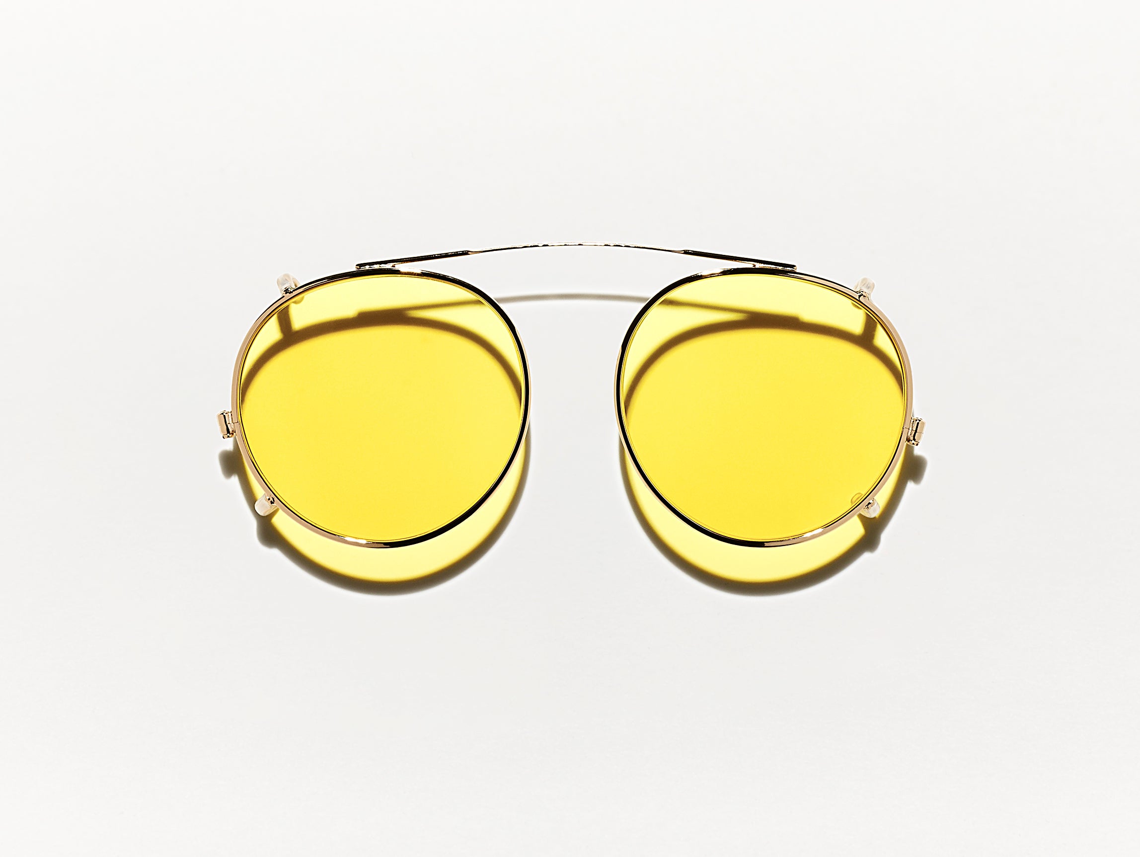 The CLIPZEN in Gold with Mellow Yellow Tinted Lenses
