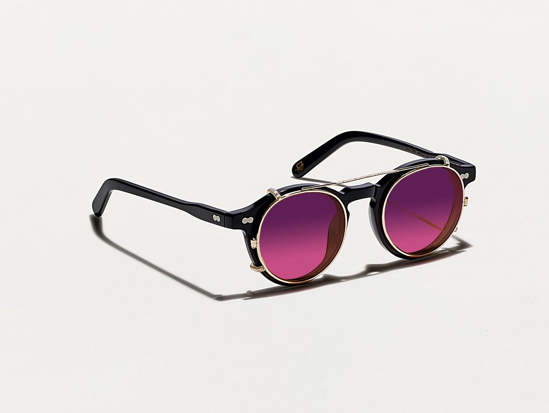 The CLIPZEN in Gold with Westside Sunset Tinted Lenses