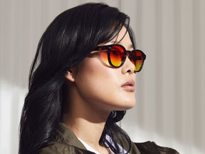 Model is wearing The LEMTOSH in Tortoise in size 49 with Candy Corn Tinted Lenses