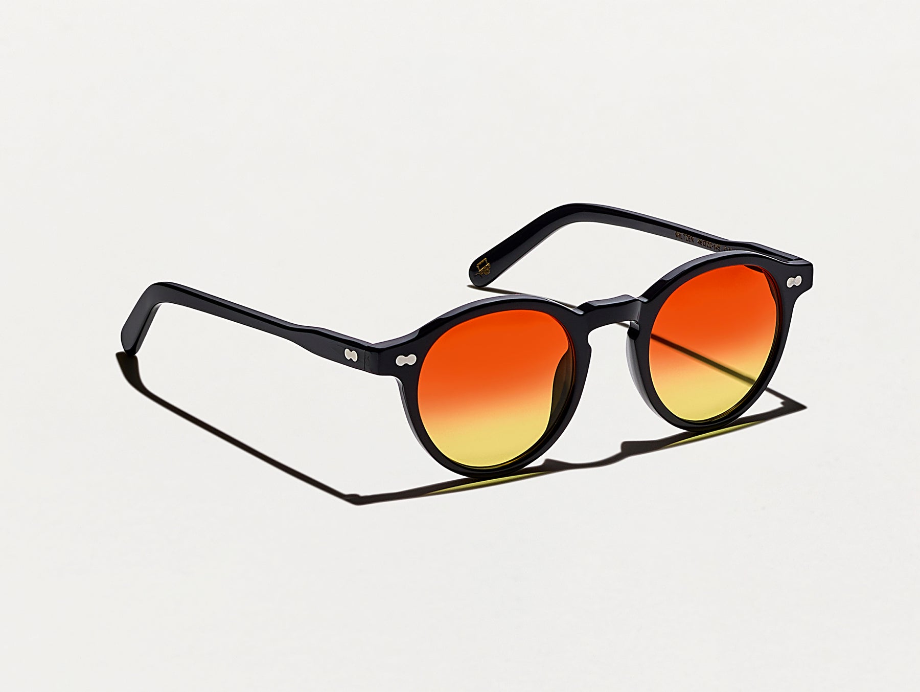 The MILTZEN Black with Candy Corn Tinted Lenses