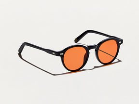 The MILTZEN Black with Woodstock Orange Tinted Lenses