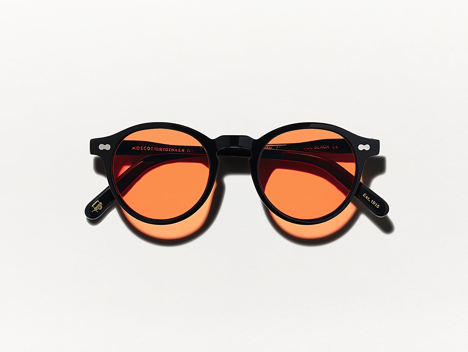 The MILTZEN Black with Woodstock Orange Tinted Lenses