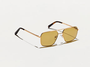 The SHTARKER in Gold with Amber Tinted Lenses