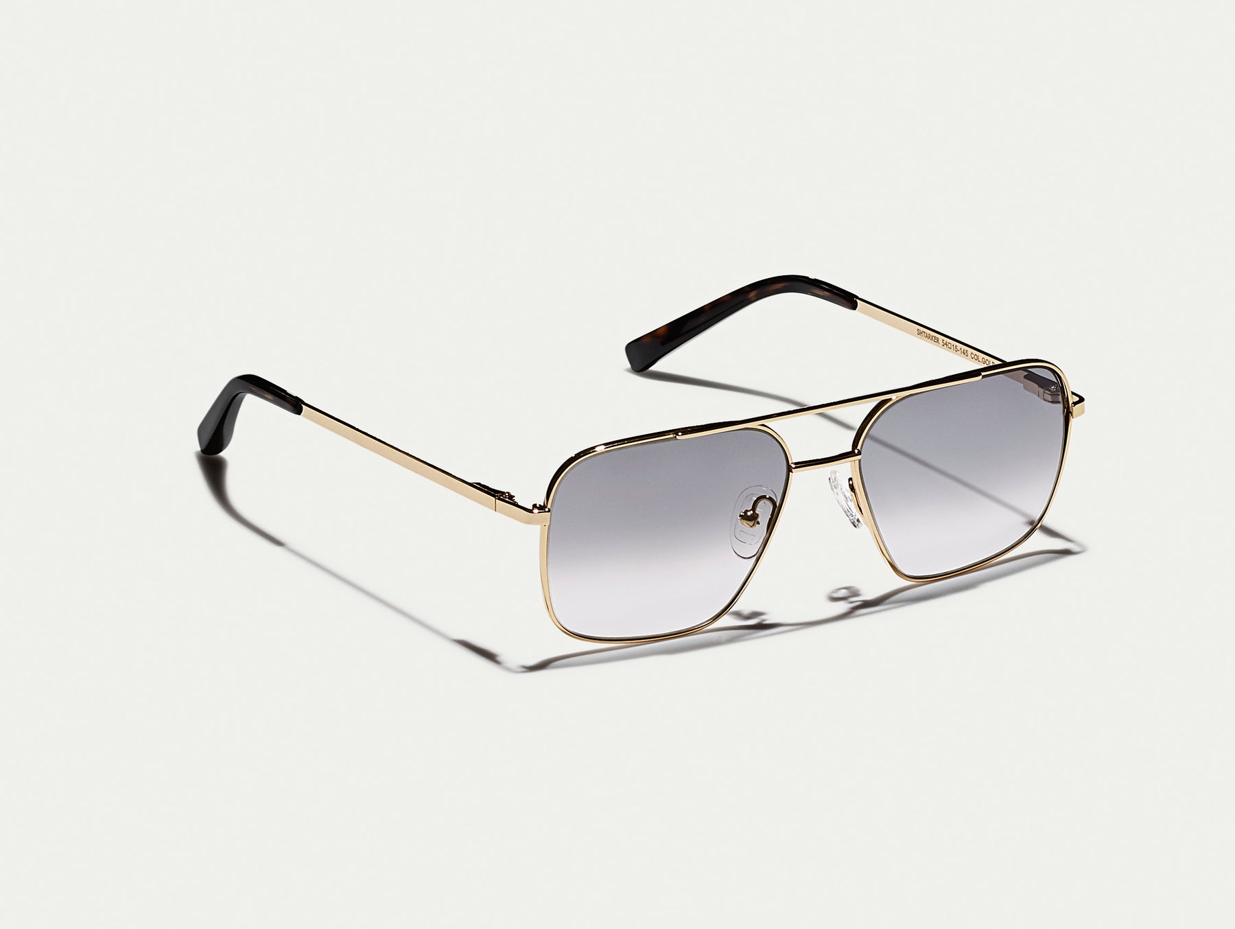 The SHTARKER in Gold with American Grey Fade Tinted Lenses