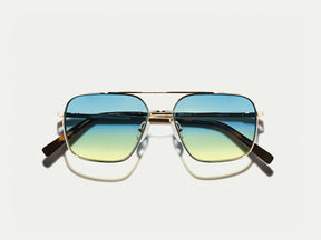 The SHTARKER in Gold with Aqua Sunrise Tinted Lenses