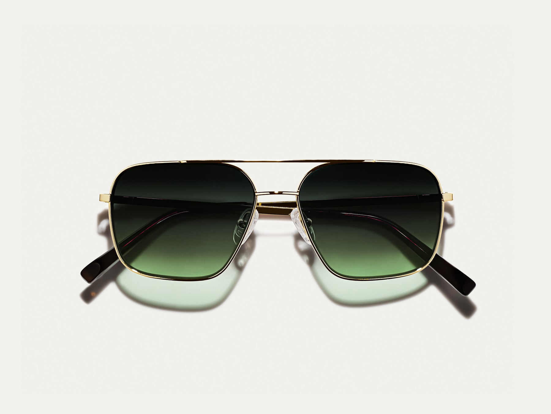 The SHTARKER in Gold with Forest Wood Tinted Lenses