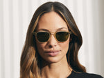 Model is wearing The VANTZ SUN in Citron/Tortoise in size 50 with Calibar Green Glass Lenses