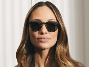 Model is wearing The VANTZ SUN in Brown/Bamboo in size 50 with G-15 Glass Lenses