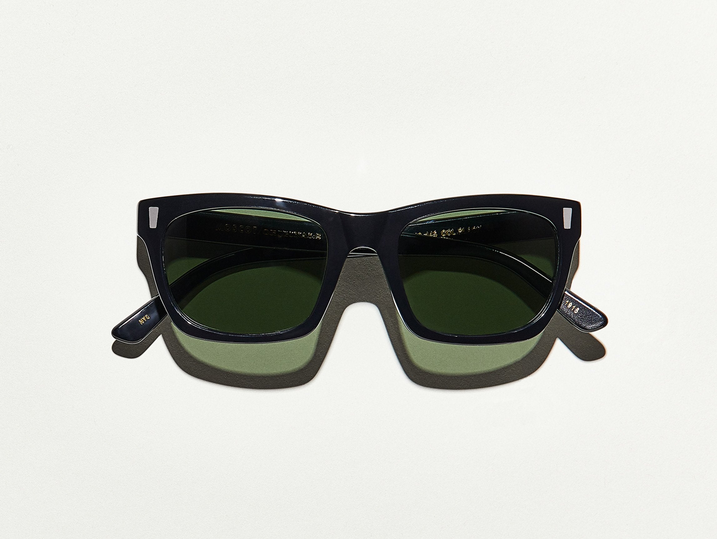 #color_black | The YONA SUN in Black with G-15 Glass Lenses