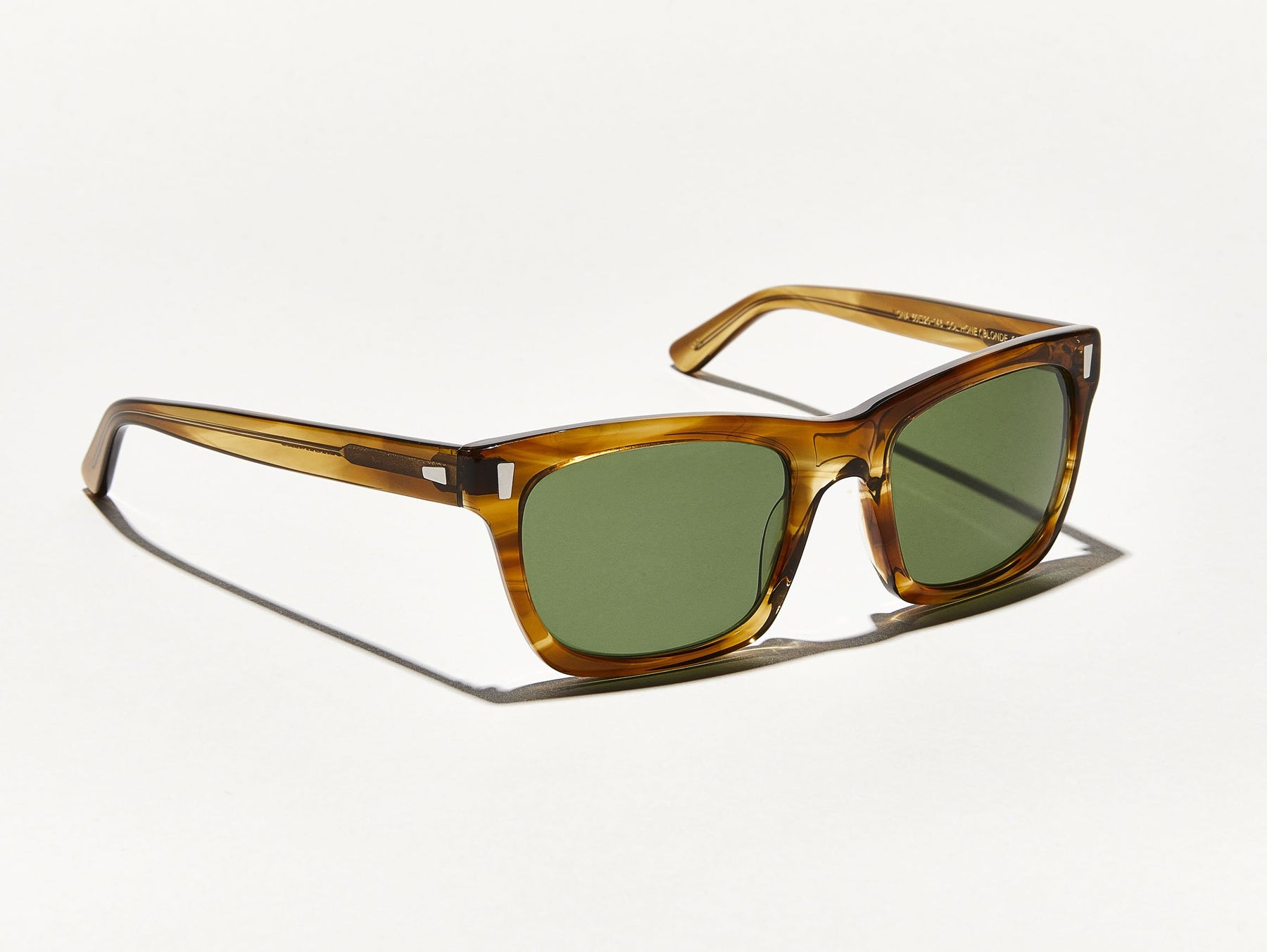 The YONA SUN in Honey Blonde with Calibar Green Glass Lenses