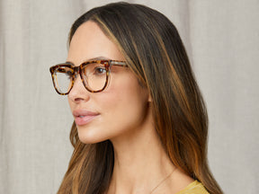 Model is wearing The YONTIF in size 52 in Tortoise/Crystal