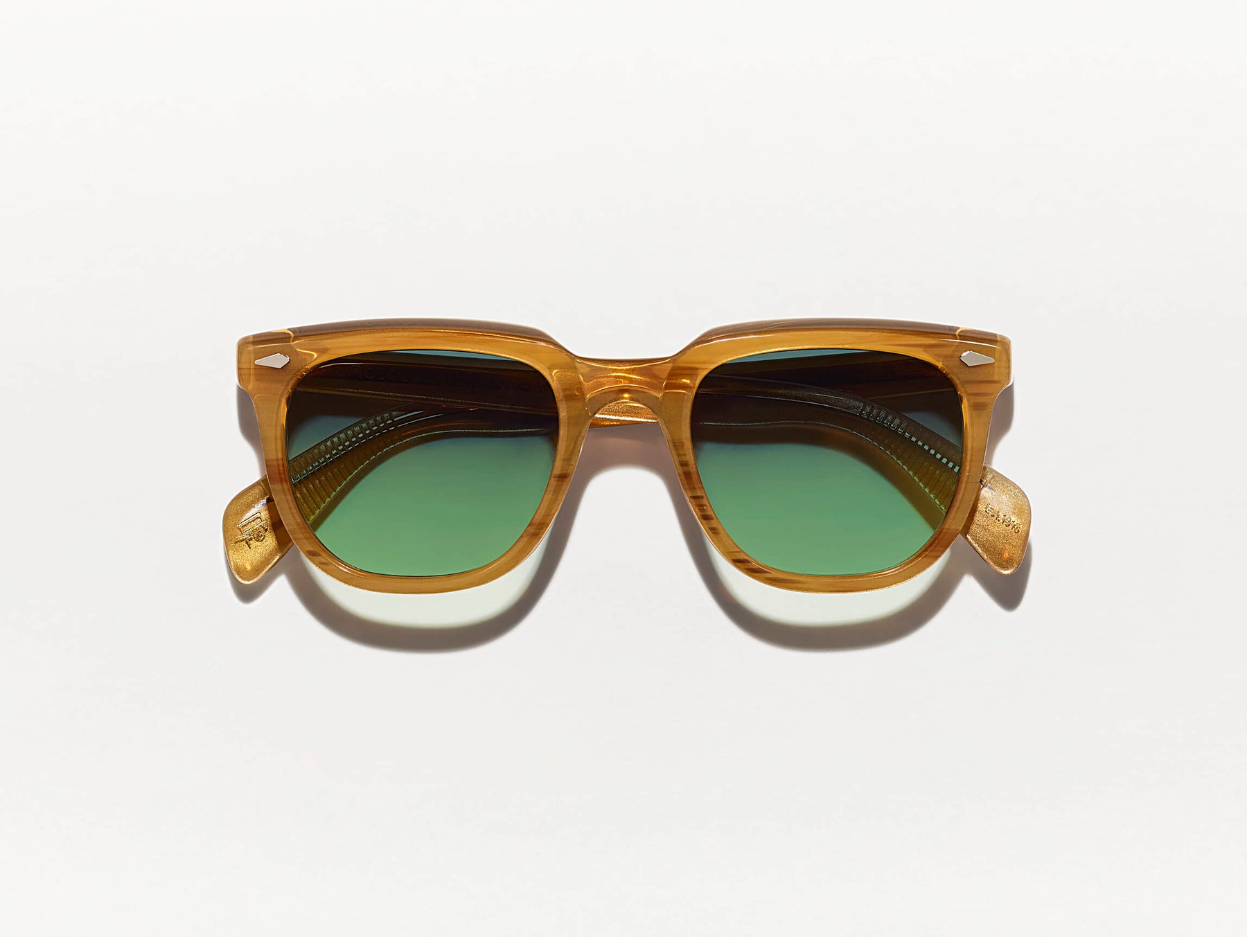 The YONTIF SUN in Blonde with Forest Green Tinted Lenses