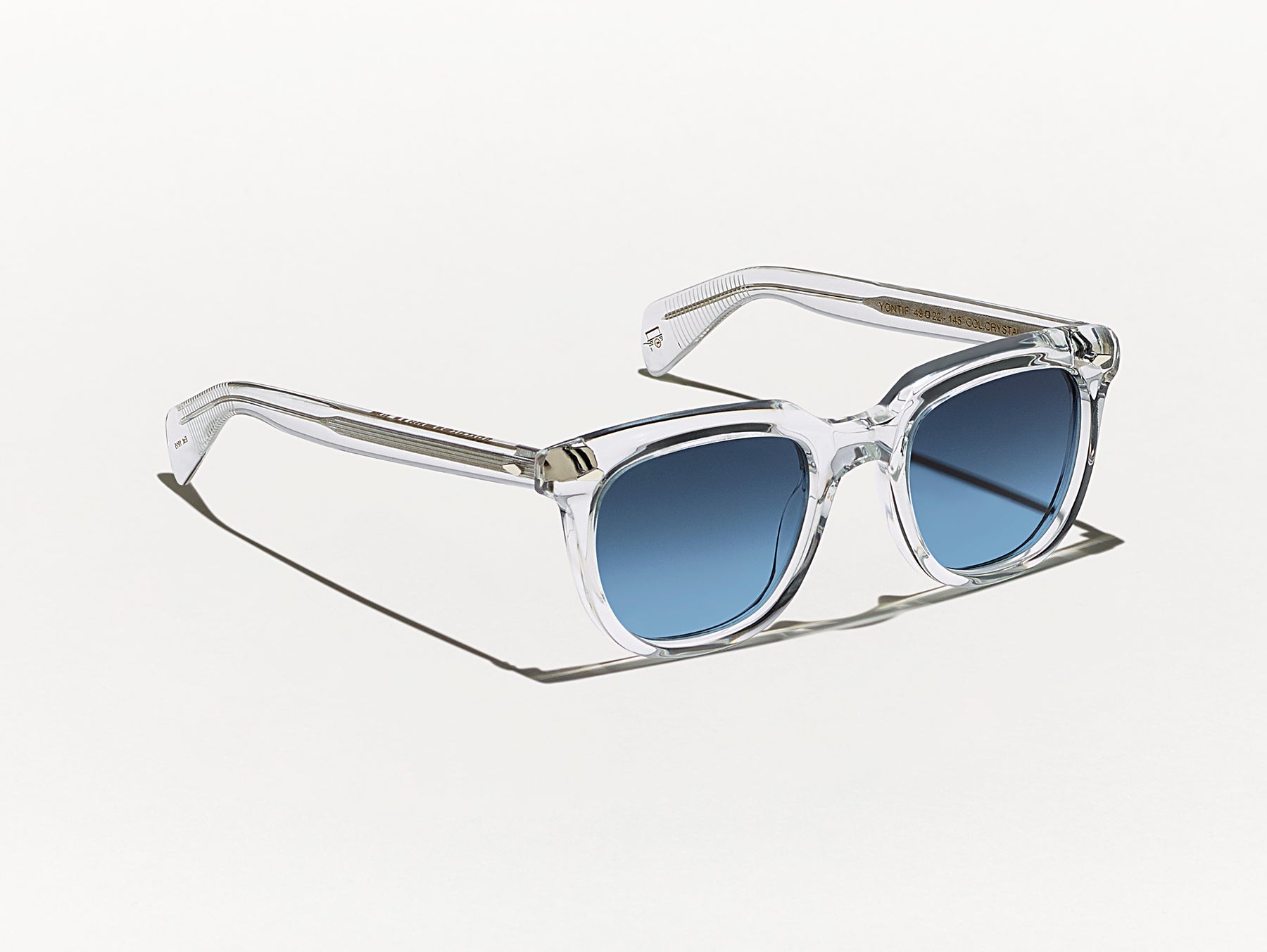 The YONTIF SUN in Crystal with Denim Blue Tinted Lenses