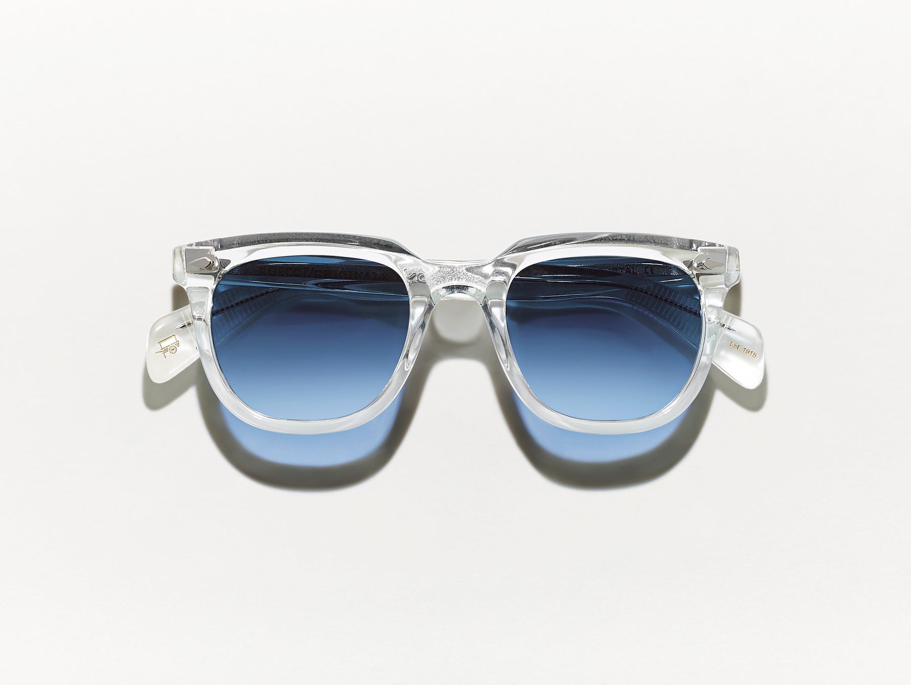 The YONTIF SUN in Crystal with Denim Blue Tinted Lenses