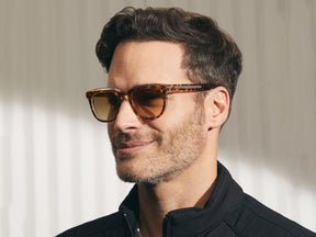Model is wearing The YONTIF SUN in Tortoise/Crystal in size 49 with Chestnut Fade Tinted Lenses