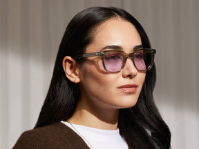 Model is wearing The YONTIF in Sage in size 49 with Lavender Tinted Lenses