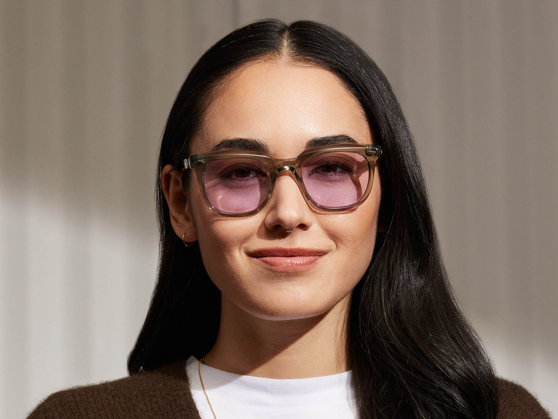 Model is wearing The YONTIF in Sage in size 49 with Lavender Tinted Lenses