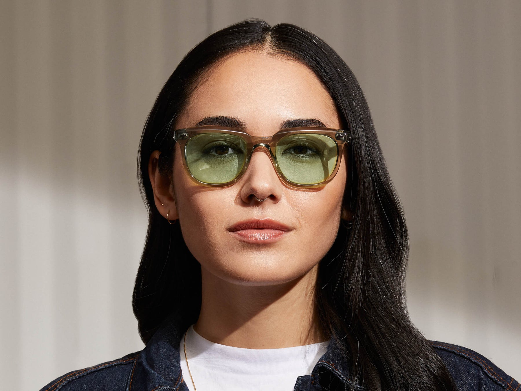 Model is wearing The YONTIF in Sage in size 49 with Limelight Tinted Lenses