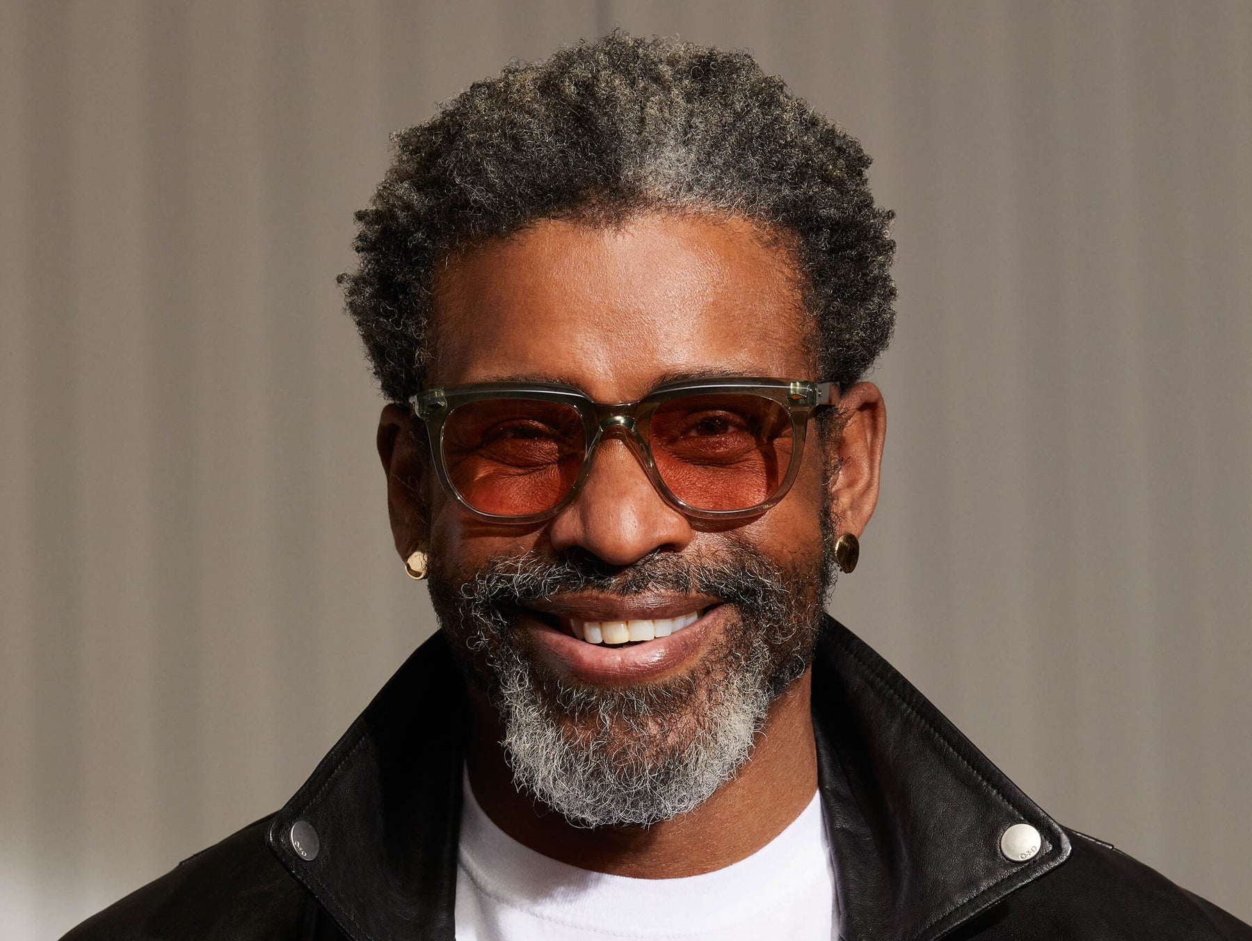 Model is wearing The YONTIF in Sage in size 52 with New York Rose Tinted Lenses