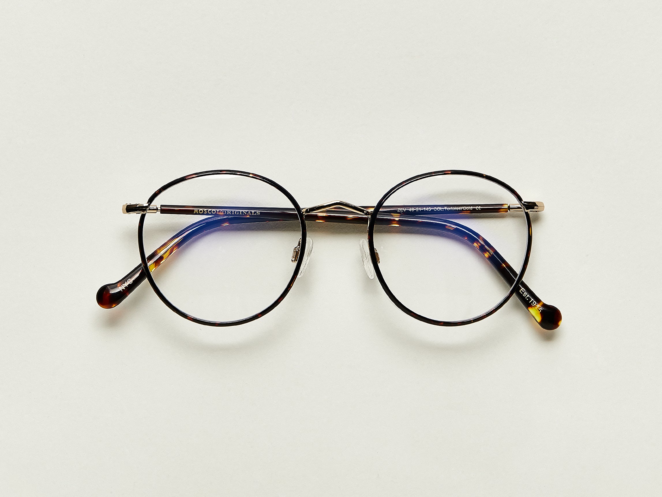 The ZEV in Tortoise/Gold with Blue Protect Lenses