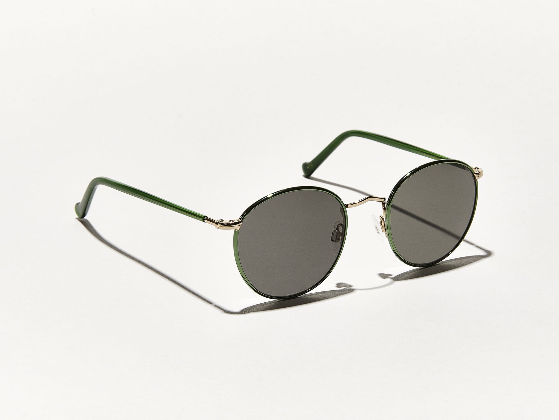 The ZEV SUN in Emerald/Gold with Grey Glass Lenses
