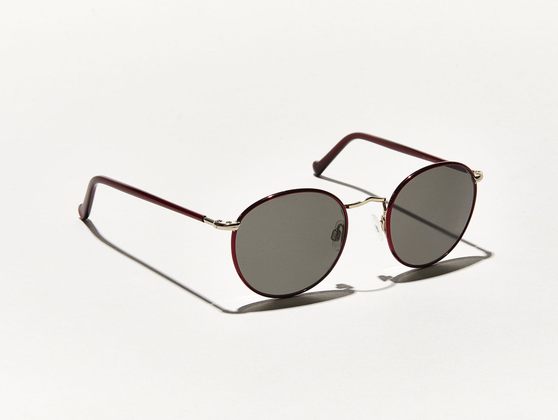 The ZEV SUN in Ruby/Gold with Grey Glass Lenses