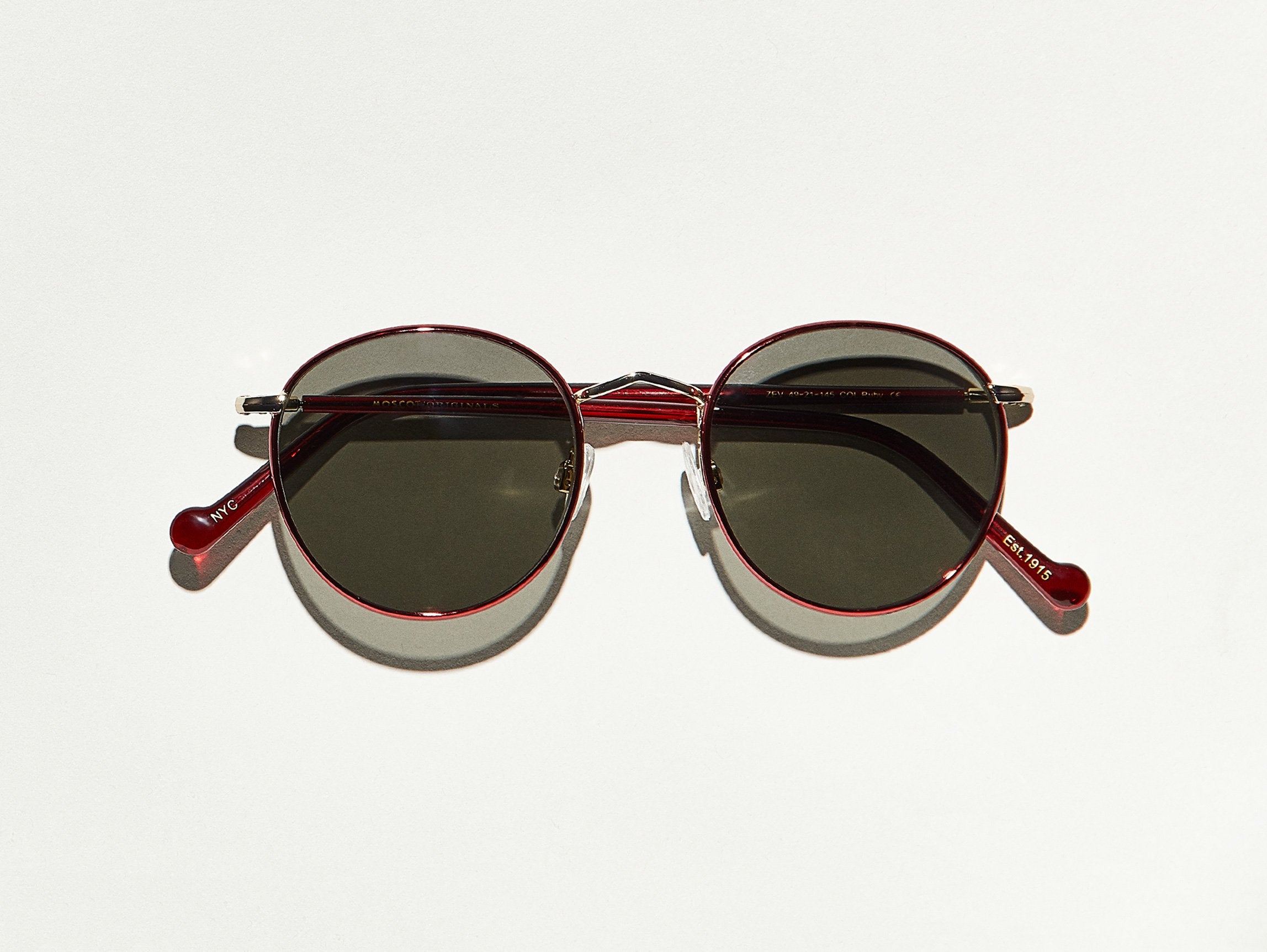 The ZEV SUN in Ruby/Gold with Grey Polarized Glass Lenses