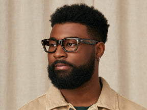 Model is wearing The ZOGAN in size 51 in Tortoise