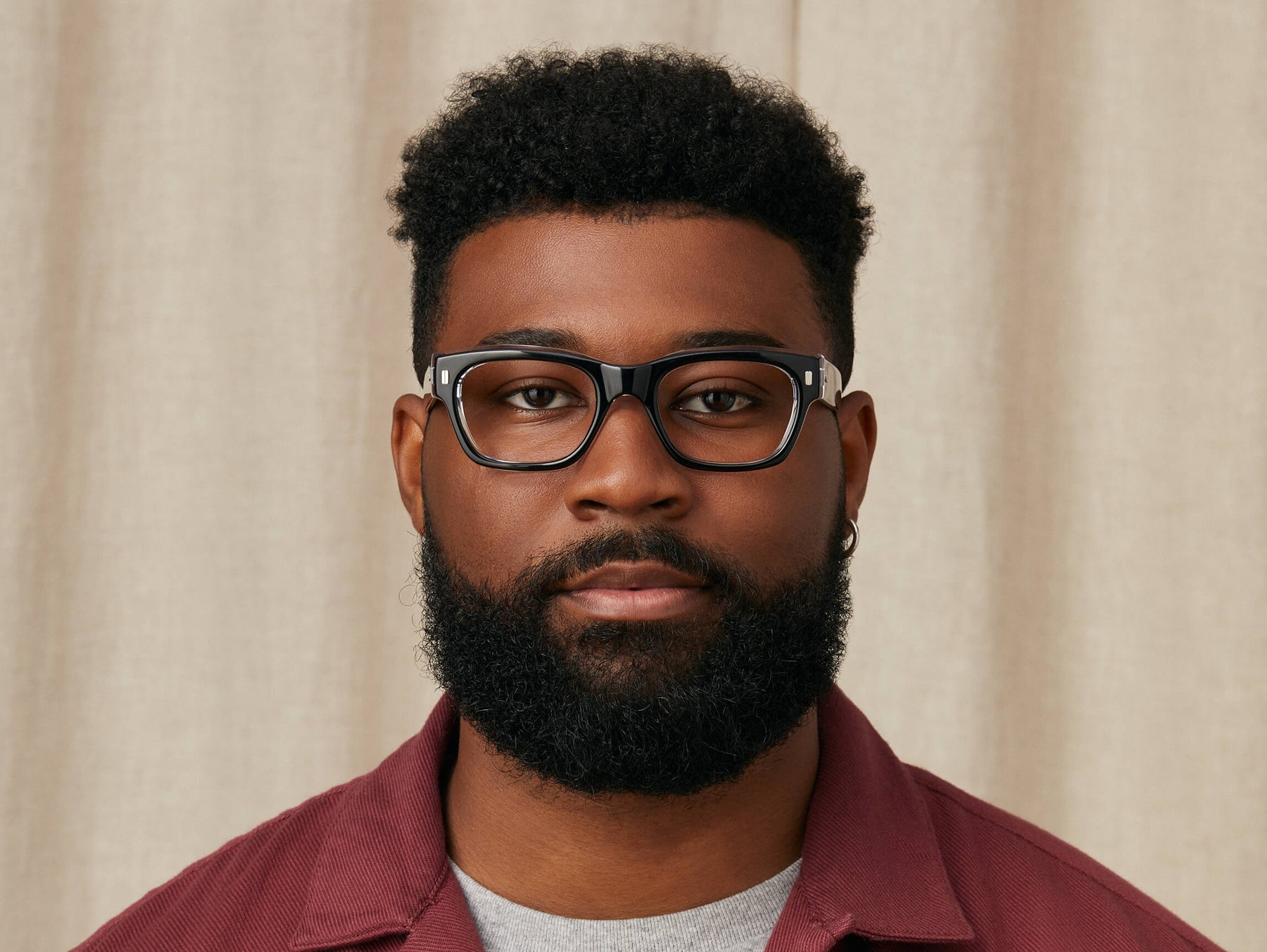 Model is wearing The ZOGAN in size 51 in Black Crystal